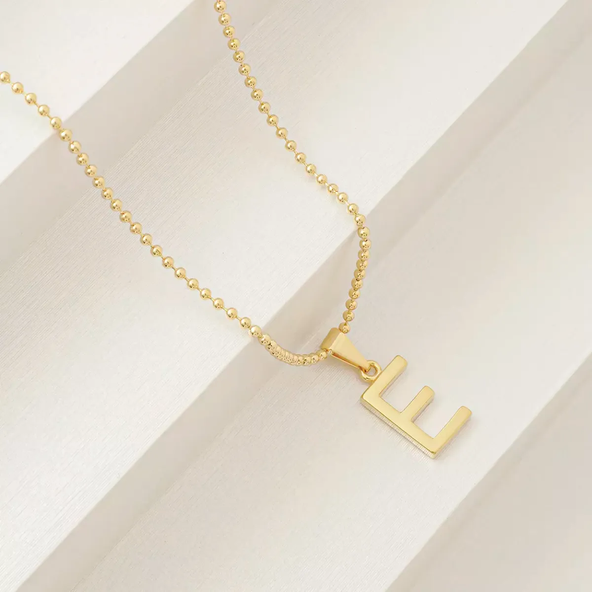 Dije Letras e — vista 2
